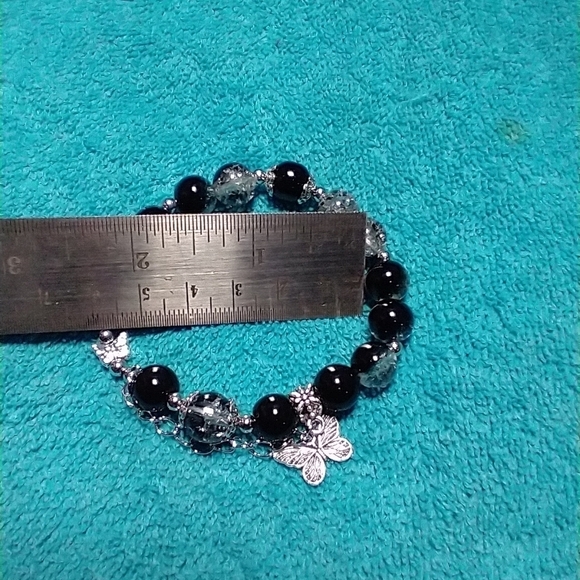 Silvertone black cracked glass butterfly stretch bracelet - Picture 3 of 3